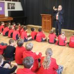 Students listening to a teacher